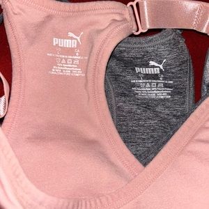 Puma sports bras! NEVER been wore and brand new! Both L with removable pads